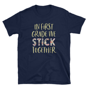 In first grade we stick together teacher Short-Sleeve Unisex T-Shirt